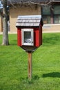 Little Neighborhood Book Sharing Library in Front of Elementary School Royalty Free Stock Photo