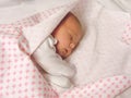 Little newborn baby girl sleeping in a sweet sleep. Royalty Free Stock Photo