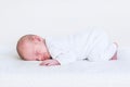 Little newborn baby sleeping on white blanket Royalty Free Stock Photo