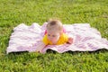 Little newborn girl lying on the grass Royalty Free Stock Photo