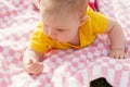 Little newborn girl lying on the grass Royalty Free Stock Photo