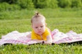 Little newborn girl lying on the grass Royalty Free Stock Photo