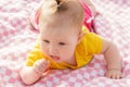 Little newborn girl lying on the grass Royalty Free Stock Photo