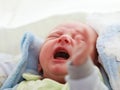 Little newborn sad baby crying Royalty Free Stock Photo