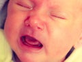 Little newborn sad baby crying Royalty Free Stock Photo