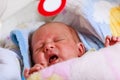 Little newborn sad baby crying Royalty Free Stock Photo