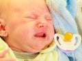 Little newborn sad baby crying Royalty Free Stock Photo