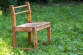 Little old chair on green grass Royalty Free Stock Photo