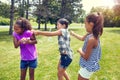 The little ones are having fun. adorable little girls playing with water balloons outdoors. Royalty Free Stock Photo