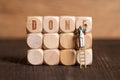 Little painter figure and cubes with the word DONE Royalty Free Stock Photo
