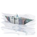 Little paper boat with 100 SEK Royalty Free Stock Photo