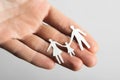 Little paper cutout family on hand