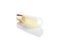 Little parfume bottle on white background