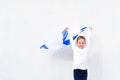 Little patriot jewish girl with flag Israel on white background.