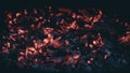 Little pieces of burning ember after the fire. Royalty Free Stock Photo