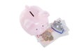 Little piggy bank and door lock over cash money Royalty Free Stock Photo