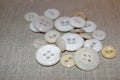 Little pile of white buttons, haberdashery