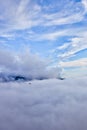 Little pilot glider. Flying above the clouds sea of clouds foggy view from a great height Aerial view from a height in in