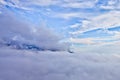 Little pilot glider. Flying above the clouds sea of clouds foggy view from a great height Aerial view from a height in in