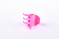 Little pink hair clip on white. Royalty Free Stock Photo