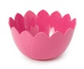 Little pink plastic bowl made in shape of flowers of lotus isolated on a white background