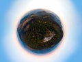 Little planet aerial view of the Recreation Mountain Pysany kamin in Carpathian mountains. autumn. Pine forest, houses on the