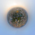 Little planet 360 degree sphere. Panorama of aerial top view of Phra Pathommachedi temple at sunset. The golden buddhist pagoda,