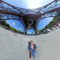 Panoramic view of a tourist in the base of the Eiffel tower Royalty Free Stock Photo