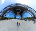 Panoramic view of a tourist in the base of the Eiffel tower Royalty Free Stock Photo