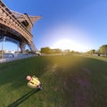 Little planet 360 degree sphere. Panoramic view of a tourist in Eiffel tower Royalty Free Stock Photo