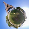 Little planet 360 degree sphere. Panoramic view of a tourist in Eiffel tower Royalty Free Stock Photo