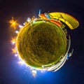 Mini planet Earth. Little planet earth with 360 viewing angel. Globe panorama of world. Planes at night with lights. Royalty Free Stock Photo