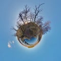 Little planet. Spherical aerial view in forest near river in nice day with nice clouds Royalty Free Stock Photo