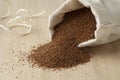 Little pouch with teff seeds Royalty Free Stock Photo