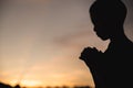 A little prayer, A boy is praying seriously and hopefully to Jesus, Pay respect prayer concept for faith spirituality and religion