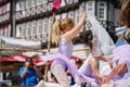 Little preschool girl dancing ballet at city festival. Beautiful happy child ballerina in tutu dress Royalty Free Stock Photo