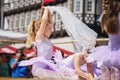 Little preschool girl dancing ballet at city festival. Beautiful happy child ballerina in tutu dress Royalty Free Stock Photo