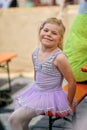 Little preschool girl dancing ballet at city festival. Beautiful happy child ballerina in tutu dress Royalty Free Stock Photo