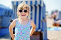 Little preschool girl playing with sand toys on the beach. Cute happy toddler child on family vacations on the sea. Kid Royalty Free Stock Photo