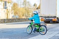 Little preschool kid boy biking on bicycle Royalty Free Stock Photo