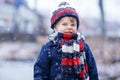 Little preschool kid boy riding with his first green bike Royalty Free Stock Photo