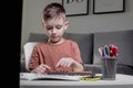 Little preschooler counting large numbers on his fingers using mental arithmetic, concept of child development Royalty Free Stock Photo