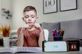 Little preschooler counting large numbers on his fingers using mental arithmetic, concept of child development Royalty Free Stock Photo