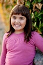 Little preteen girl in park Royalty Free Stock Photo