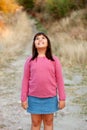 Little preteen girl in park Royalty Free Stock Photo