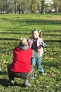 Little pretty child happy running to father