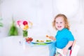 Little pretty girl eating salad for lunch Royalty Free Stock Photo