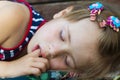 Little pretty girl sleeping, sucking thumb and having sweet drea Royalty Free Stock Photo