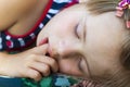 Little pretty girl sleeping, sucking thumb and having sweet dreams Royalty Free Stock Photo