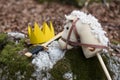 Little prince equipment a sword a paper crown and a stick horse